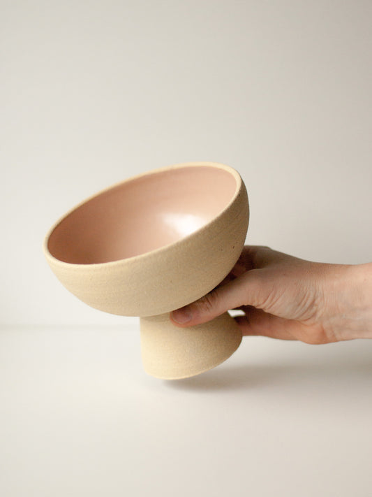 Coupe à pied rose poudré